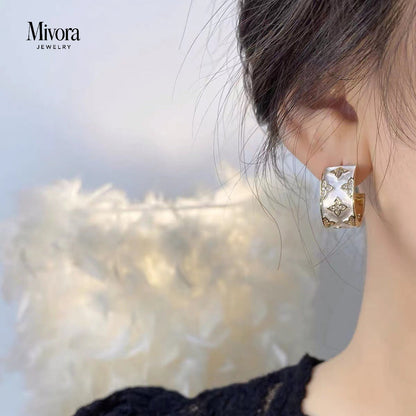 FOUR-LEAF CLOVER EARRINGS + RINGS