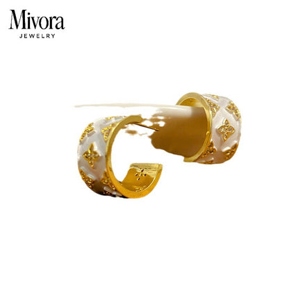 FOUR-LEAF CLOVER EARRINGS + RINGS